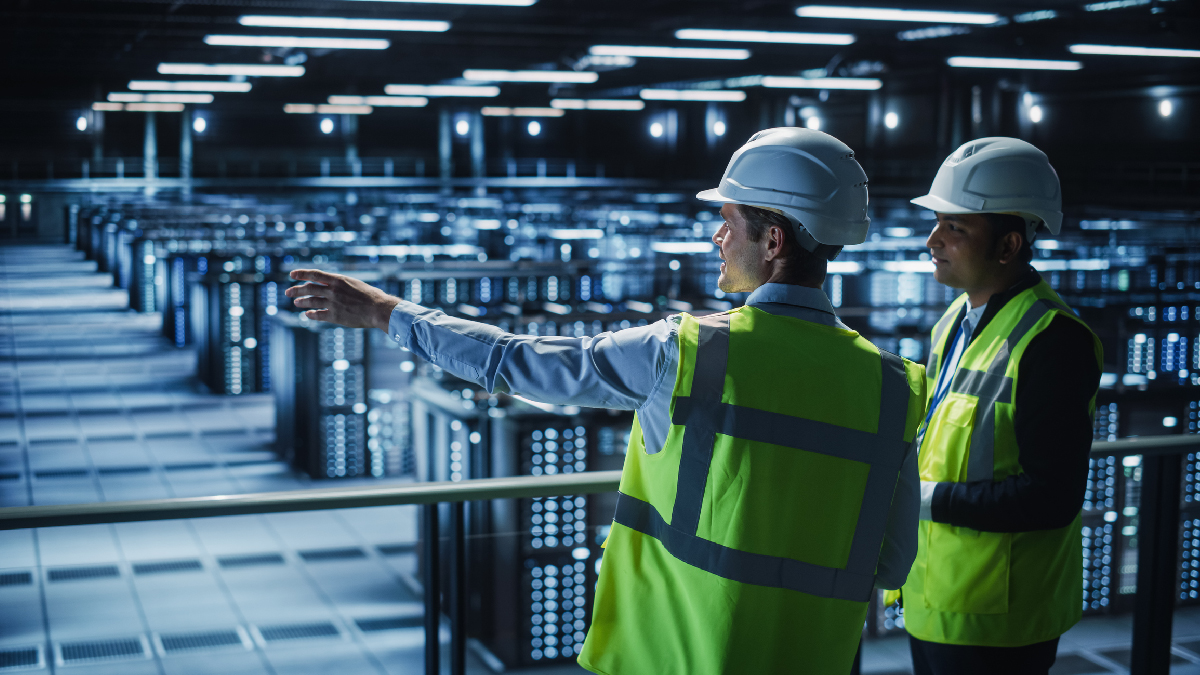 Network engineers reviewing a data centre